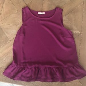 Sleeveless top with ruffled bottom